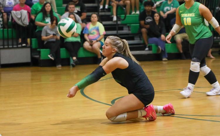 Suwannee libero Ansleigh Kelley dives for a dig against Columbia on Oct. 9. (BRENT KUYKENDALL/Lake City Reporter)