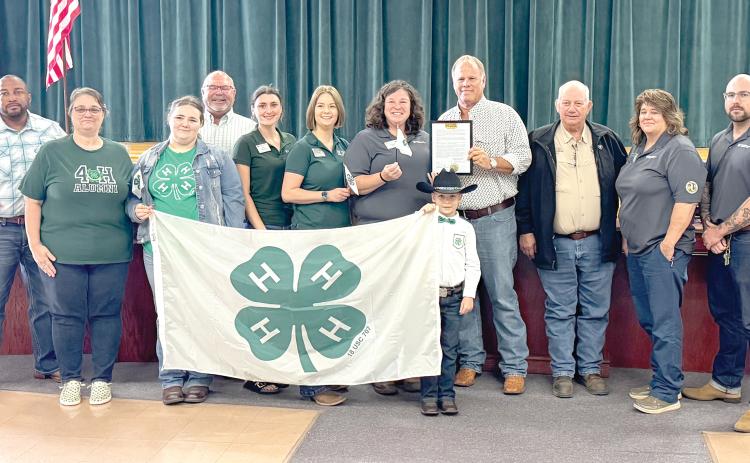The Columbia County Commission approved a proclamation Thursday declaring Oct. 5-11 as National 4-H Week in Columbia County. Accepting the proclamation were UF/IFAS Columbia County Extension agents and 4-H youth. (JAMIE WACHTER/Lake City Reporter)
