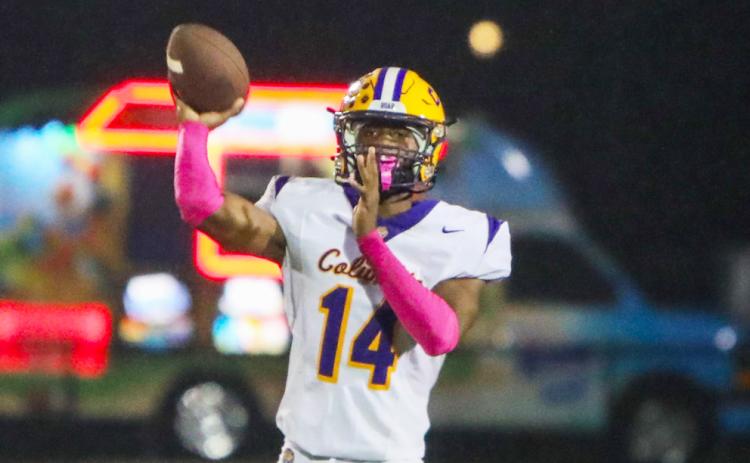 Columbia quarterback Xavier Collins throws a pass against Ridgeview on Oct. 10. (BRENT KUYKENDALL/Lake City Reporter)