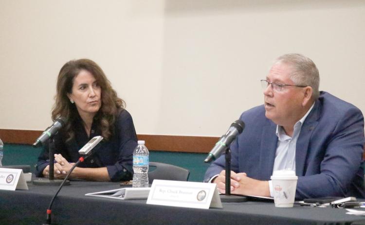 Rep. Chuck Brannan (right) speaks during Tuesday’s legislative delegation meeting at Florida Gateway College while Sen. Jennifer Bradley listens. (JAMIE WACHTER/Lake City Reporter)