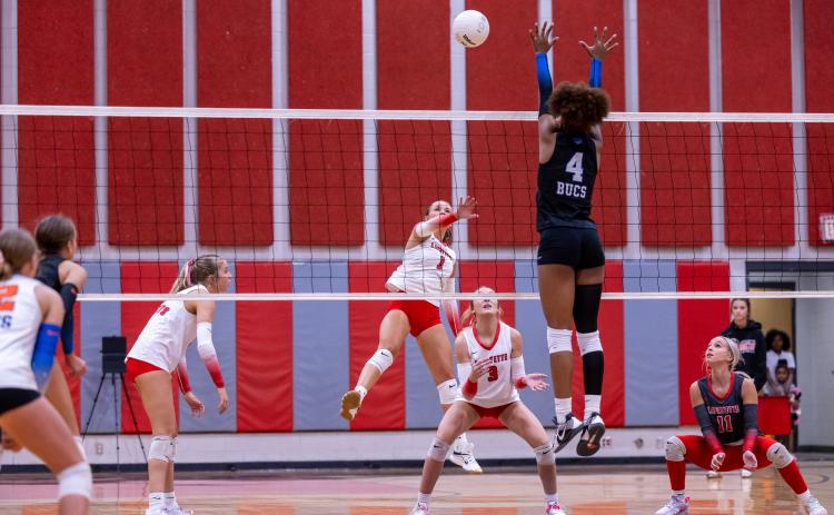Lafayette hitter Brooke Lamb fires a shot against Branford on Oct. 9. (JACK HOWDESHELL/Lake City Reporter)
