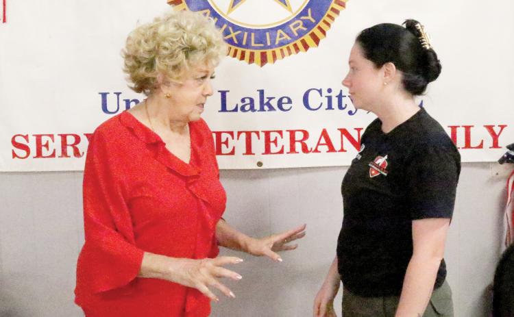 TONY BRITT/Lake City Reporter Patricia Proctor with the American Legion Post 57 (left) and Katelyn Holley with South East Elite Working Dogs talk Wednesday about the Legionnaire Dogs program that is being launched by the Legion with help from Holley and the Lake City Humane Society. The program will help get local veterans with companion or service dogs at no cost. (TONY BRITT/Lake City Reporter)