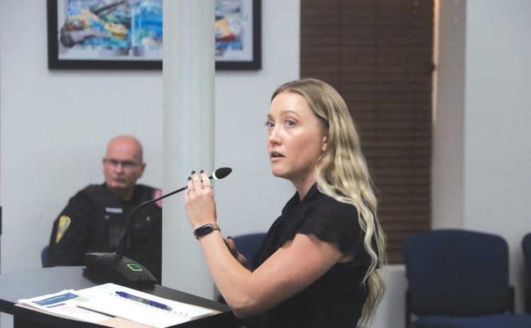 Lauren Rushing, a project manager with NUE Urban Concepts, gives a presentation to the Lake City Council at Monday’s meeting. (MORGAN MCMULLEN/Lake City Reporter)