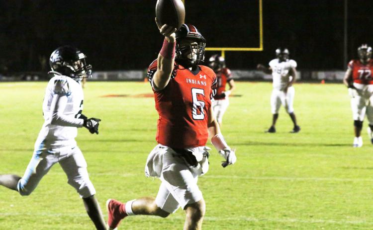 Fort White quarterback Matthew Pitts celebrates after a touchdown Friday against Zarephath Academy. (MORGAN MCMULLEN/Lake City Reporter)