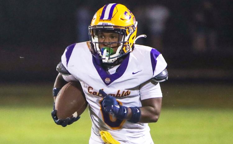 Columbia running back Jeffery Pope looks for running room against Ridgeview on Friday. (BRENT KUYKENDALL/Lake City Reporter)