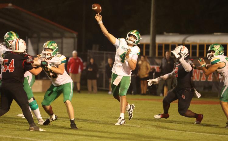 Suwannee quarterback Thomas Sikes throws a pass against Baker County last Friday. (PAUL BUCHANAN/Lake City Reporter)