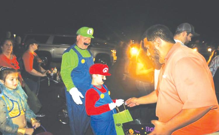 Robert Stalvey and Hagan Stalvey, then 7, dressed up as Mario and Luigi during the 2019 Trunk or Treat event. (FILE)