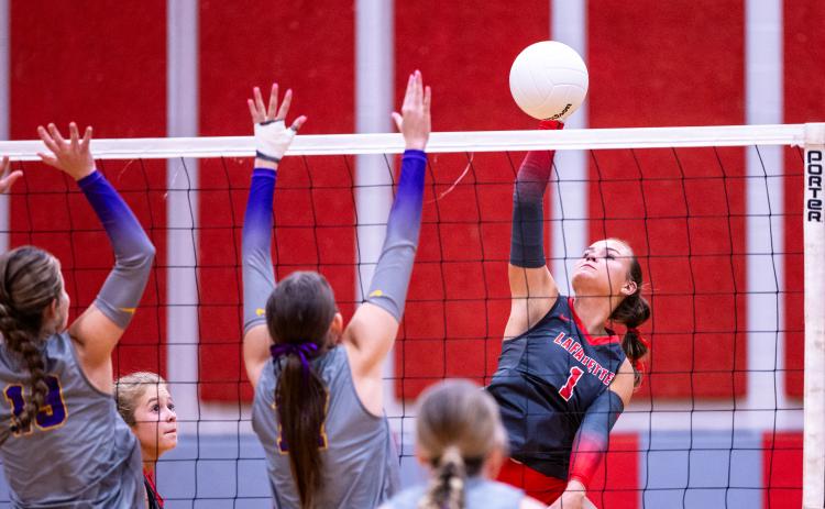 Lafayette hitter Brooke Lamb fires a shot against Columbia on Sept. 29. (JACK HOWDESHELL/Lake City Reporter)