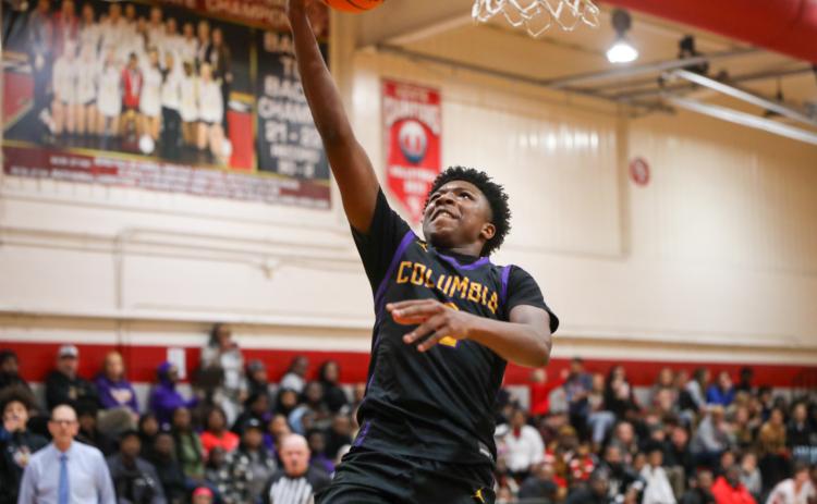 Columbia guard Shaheed White rises for a layup against Santa Fe last season. (FILE )