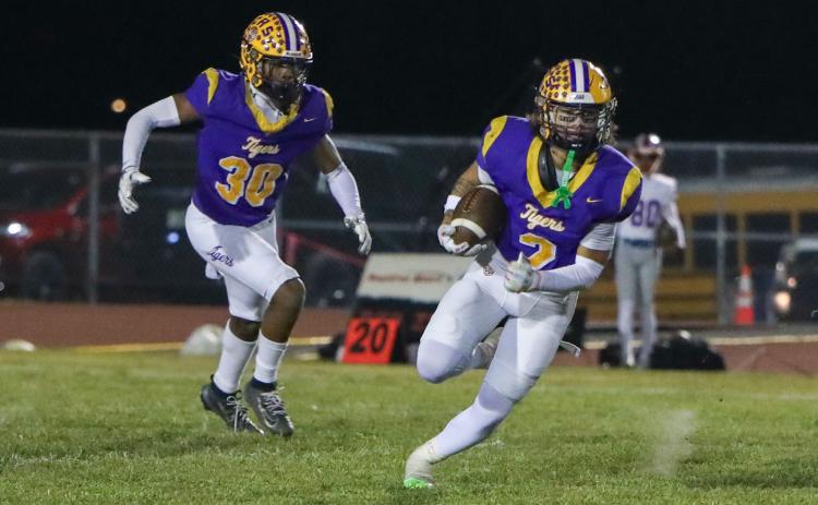 Columbia safety Julian De La Cruz returns an interception against Bolles on Oct. 31. (BRENT KUYKENDALL/Lake City Reporter)