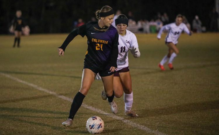 Columbia's Laelle Thompson dribbles against Chiles on Nov. 11. (BRENT KUYKENDALL/Lake City Reporter)