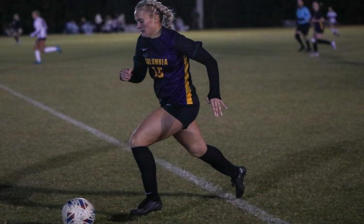 Columbia's Zoe Bulock dribbles up the field against Chiles on Nov. 11. (BRENT KUYKENDALL/Lake City Reporter)