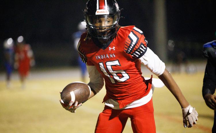 Fort White receiver Desean Lally scores a touchdown against Wildwood during the FIT quarterfinals on  Nov. 20. (BRENT KUYKENDALL/Lake City Reporter)