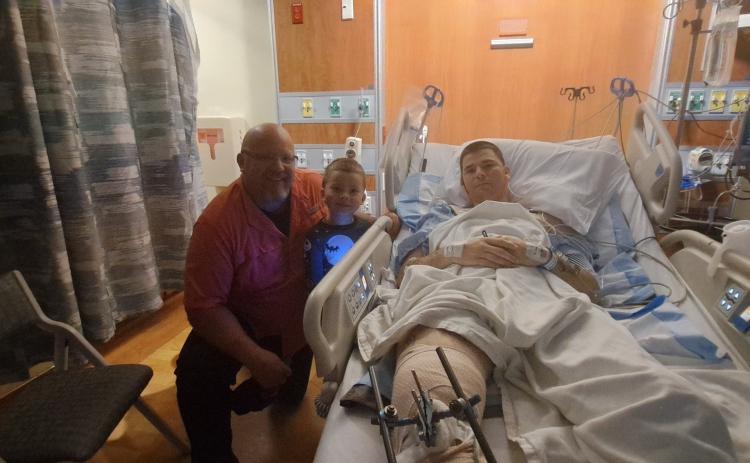 Christopher Davis, a Live Oak police officer, was released from UF Health Shands Hospital on Wednesday. He was seriously injured in a motorcycle crash last Thursday. (COURTESY)