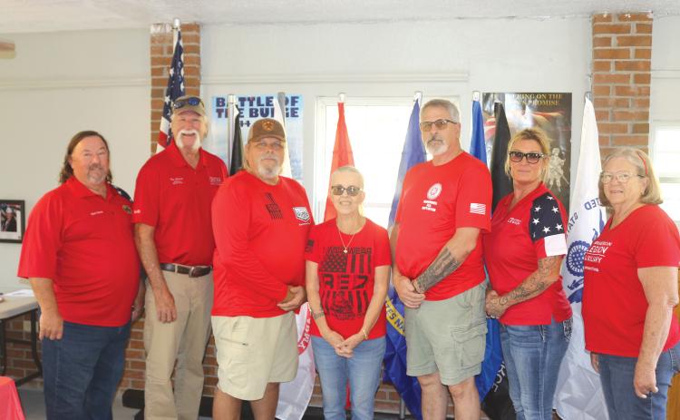 American Legion Post 423 officers Commander Mark Beebe (from left), First vice Tom Johnson, Finance officer Chuck Caldwell, Service officer Rusty Ann Brown, Sgt. at Arms Michael McKinney, Historian Seven Beebe and Auxiliary President Lisa Dye. (TONY BRITT/Lake City Reporter)