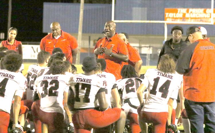 Fort White coach Demetric Jackson addresses his team following a 20-3 loss to Taylor County on Aug. 22. (MORGAN MCMULLEN/Lake City Reporter)