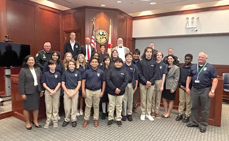 Students in Epiphany Catholic School’s ASTRA Club met with Circuit Judge Leandra Johnson, Sheriff Wallace Kitchings, Clerk of Court Jay Swisher, State Attorney John Durrett and Public Defender Cliff Wilson last week to learn about the judicial system. (COURTESY)