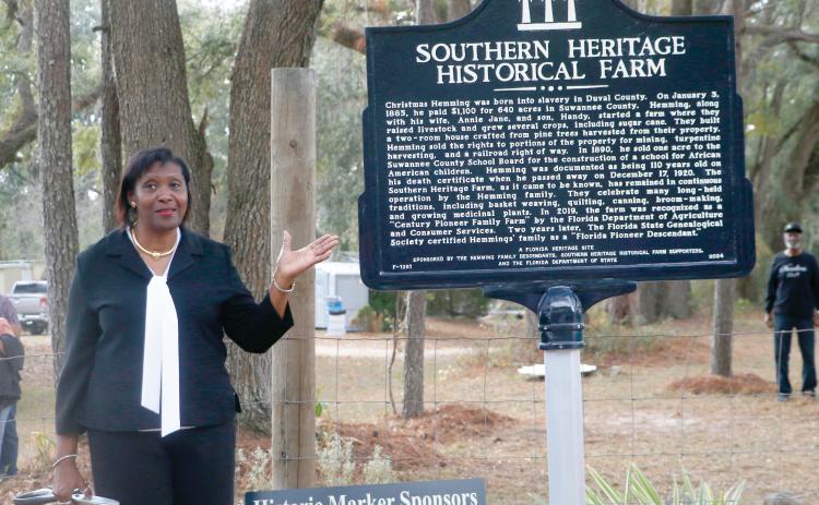 Pat Hines Mitchell talks about the Southern Heritage Historical Farm’s historical marker after it was unveiled Saturday during a ceremony at the farm southwest of Live Oak. (JAMIE WACHTER/Lake City Reporter)