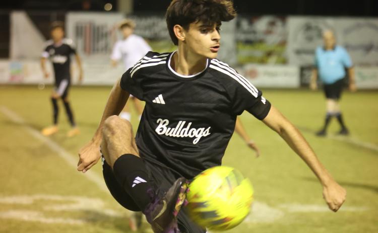 Suwannee's Rember Alonso gathers possession against Columbia on Nov. 5. (PAUL BUCHANAN/Lake City Reporter)