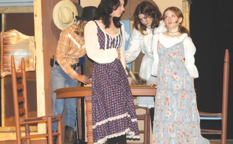 Morgan Fenwick (left) and Klowe Redding rehearse a scene for the upcoming production of ‘Romeo and Juliet Go West.’ (TONY BRITT/Lake City Reporter)