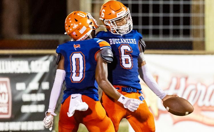 Branford running back TC Smith (6) celebrates with receiver Maurice Vought after scoring a touchdown against Hilliard on Sept. 26. (JACK HOWDESHELL/Lake City Reporter)