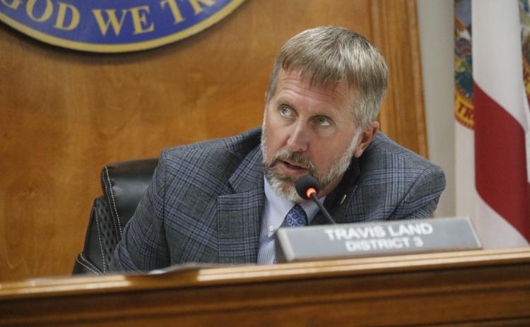 Travis Land, the Suwannee County Commission chairman, said he supported the change for the Frier Finance property to help providing housing in the future. (JAMIE WACHTER/Lake City Reporter)