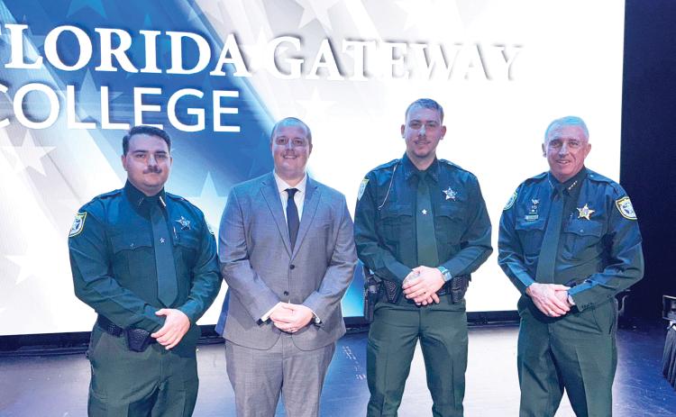 Cadets with the Columbia County Sheriff’s Office graduated Wednesday from the police academy at Florida Gateway College. Graduates were Jesse Braden (from left), Jarrod Spurlock and Anthony Cortese, Jr. Sheriff Wallace Kitchings is pictured with the graduates. (COURTESY)