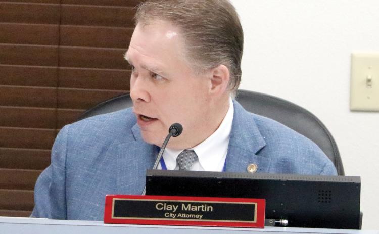 Lake City Attorney Clay Martin speaks during Monday’s City Council meeting. (MORGAN MCMULLEN/Lake City Reporter)