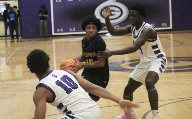 Columbia guard Zadrian Knowlton drives into the lane against Gainesville on Tuesday. (JORDAN KROEGER/Lake City Reporter)