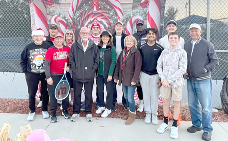 The Lake City Columbia County Tennis Association raised money and collected toys for the Christmas Dream Machine at a Mistletoe Tennis Social event Tuesday. (COURTESY)