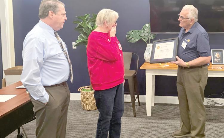 Meally Jenkins, the founder of the Christmas Dream Machine, reacts as the Rotary Club of Lake City Sunrise recognized her as a Paul Harris Fellow during its Dec. 3 meeting. (COURTESY ROTARY CLUB OF LAKE CITY SUNRISE)