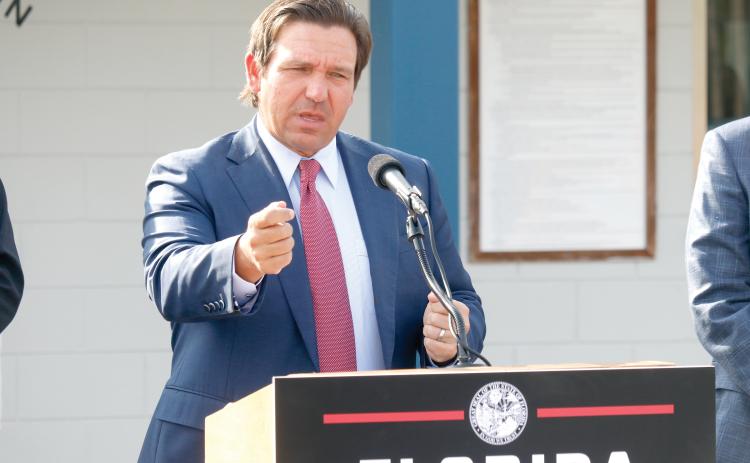 Gov. Ron DeSantis talks about Operation Tidal Wave and the state’s success in supporting federal immigration enforcement, including the use of Baker Correctional Institution, ‘Deportation Depot,’ and the Lake City Gateway Airport. (JAMIE WACHTER/Lake City Reporter)