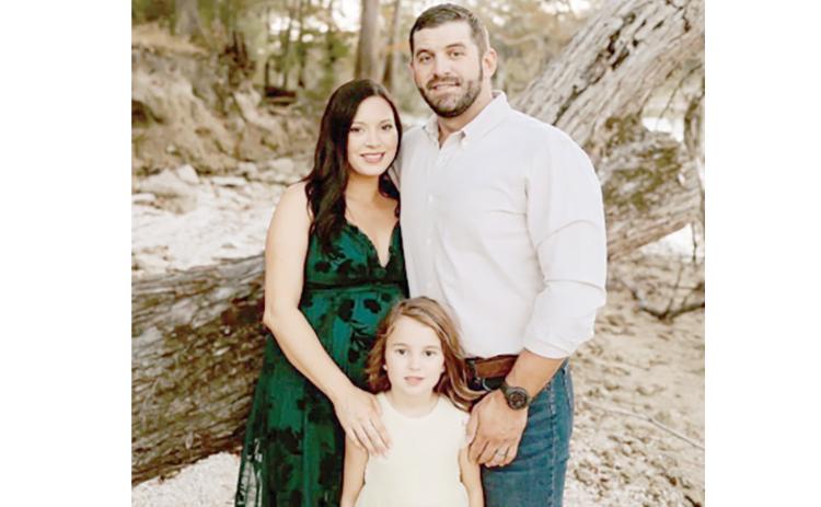 Dwayne Law, a Central Florida Electric Cooperative lineman, is left raising his daughter, Lolliegh, and newborn son, Landry, after his wife, Kaitlynn, passed away during childbirth in December. A benefit luncheon is set for Feb. 19 to help the family. (COURTESY)