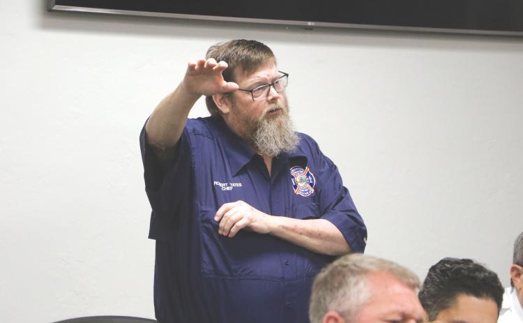 Robert Yates, shown speaking at a Branford Town Council workshop in January about consolidating its service into Suwannee County’s paid service, resigned as fire chief for the town last week. (FILE)