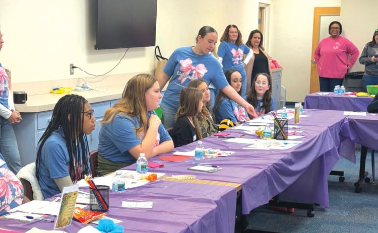 The Altrusa Girls Summit, attended by 18 sixth-graders, gave information to students regarding finances as well as being ‘intentional’ with one’s thoughts. (COURTESY)