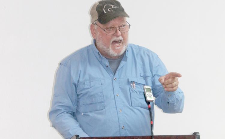 Fort White resident Carl King angrily responds to the Fort White Town Council during its special meeting Tuesday night about town dissolution. (TONY BRITT/Lake City Reporter)