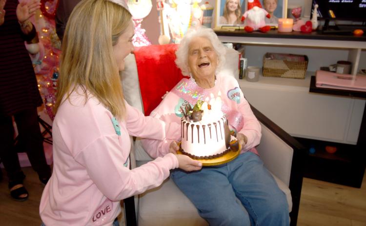 Helena Powers smiles as she sees her 110th birthday cake earlier this month. (JOHN CLARE STOKES/Special to the Reporter)