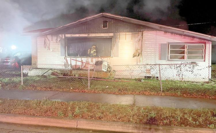 A SE Murray Street house was severely damaged by a fire Saturday night. A dog was killed in the blaze. (COURTESY LAKE CITY FIRE DEPARTMENT)