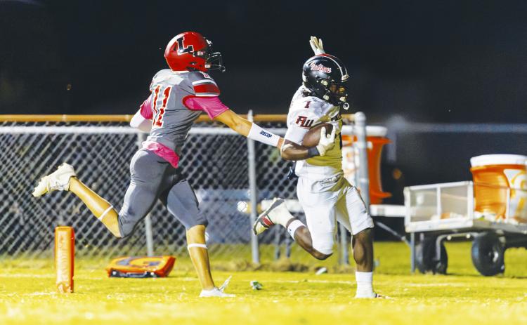 Fort White running back John'l Lawson scores a touchdown against Lafayette on Oct. 3, 2025. (JACK HOWDESHELL/Lake City Reporter)