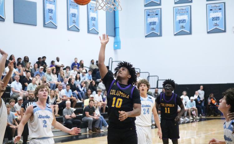 Columbia guard Zadrian Knowlton gets through the Ponte Vedra defense for a layup during the Region 1-5A semifinals on Feb. 21. (JORDAN KROEGER/Lake City Reporter)