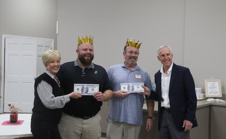James Carter and Eddie Kurtz are presented their prizes after winning the Lake City Garden Club's annual Scrabble Tournament. (MORGAN MCMULLEN/Lake City Reporter)