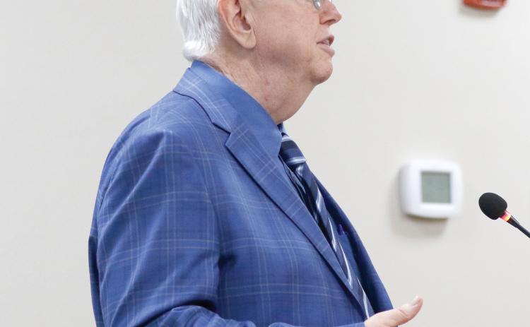 Raftelis Senior Vice President Henry Thomas speaks with the North Florida Water Utilities Authority board about its preliminary rate study. (JAMIE WACHTER/Lake City Reporter)