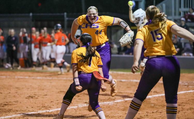Columbia pitcher Josie Raulerson (44) celebrates with teammates after finishing off a 3-2 win over Trenton with a strikeout on Thursday. (BRENT KUYKENDALL/Lake City Reporter)