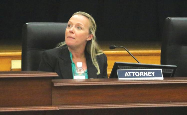 Columbia County School Board Attorney Meagan Logan listens during a previous school board meeting. Logan will remain the board’s attorney through March 31, 2029, after the board approved a new deal. (FILE)