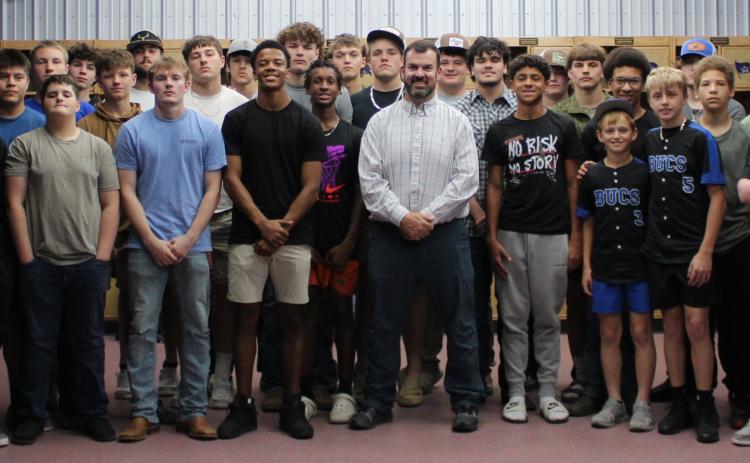 New Branford coach Will Dettor (white shirt) is pictured with his new team. (COURTESY)