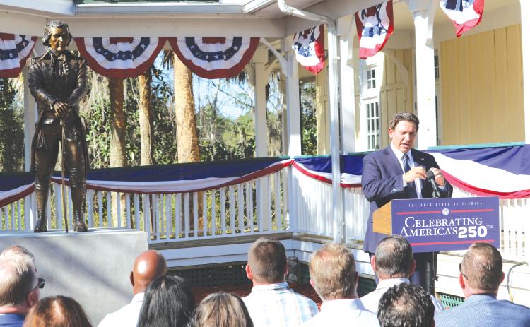Gov. Ron DeSantis delivers remarks during an unveiling ceremony for a statue of Alexander Hamilton at the Heritage Center in White Springs on Wednesday. (TONY BRITT/Lake City Reporter)