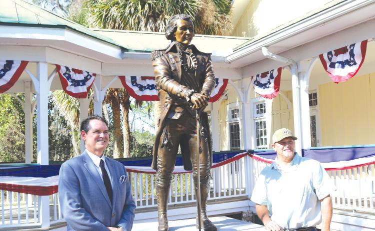 Florida Secretary of State Cord Byrd (left) stands with Bradley Cooley, the sculptor who created Alexander Hamilton statue unveiled on Wednesday at the Heritage Center in White Springs. (TONY BRITT/Lake City Reporter)