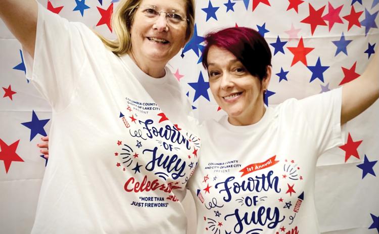 Art League President Laura Hunter-Null (left) and Gateway Art Gallery Curator Sheila Carr model last year’s winning T-shirt, designed by Erin Weiffenbach. (COURTESY)