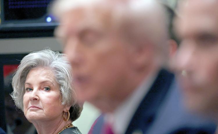 White House chief of staff Susie Wiles, a Lake City native (left), looks on at President Donald Trump in the Cabinet Room of the White House in Washington, D.C., on Oct. 17, 2025, has been diagnosed with ‘early stage’ breast cancer. (Tom Brenner/AFP/Getty Images/TNS)