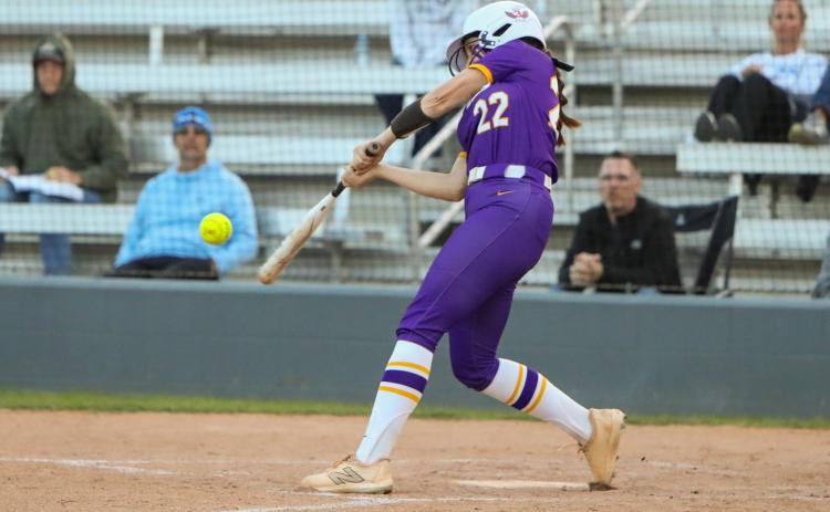 Columbia catcher Emily Delgado hits a home run against Bartram Trail on March 19. (BRENT KUYKENDALL/Lake City Reporter)